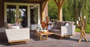 Home Garden - Two Women Sitting on Sofa