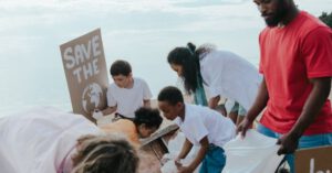 Environmental Education - People Cleaning the Beach