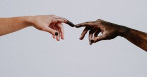 Community Art - Hands of people reaching to each other