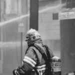 Safety First - Grayscale Photo of Firefighter