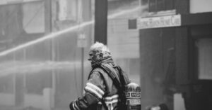 Safety First - Grayscale Photo of Firefighter