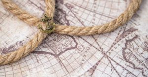 Memorable Journey - Brown Rope on White Paper