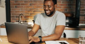 Home Education Tech - Man Using a Laptop