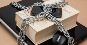 Privacy Protection - Black Android Smartphone on Top of White Book