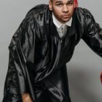 Sports Academics - Photo of Man in Black Academic Dress Playing Basketball
