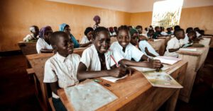 Education Trends - smile face happy to receive siting desks